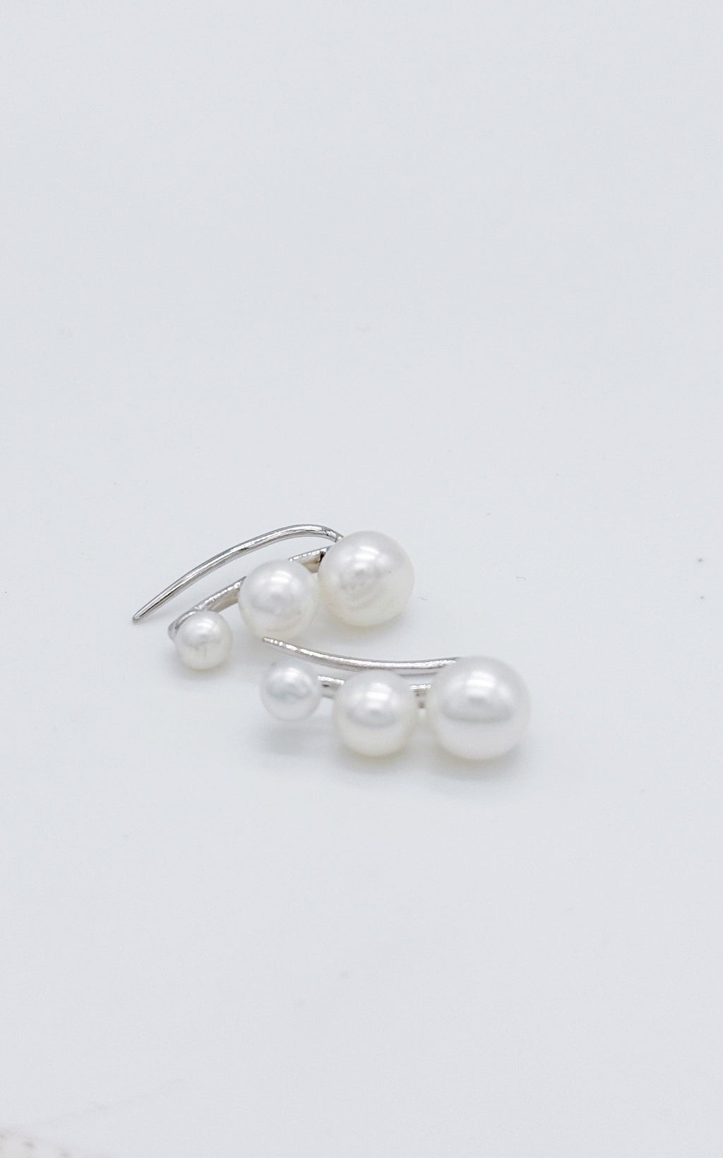 Three-pearl multiple earrings