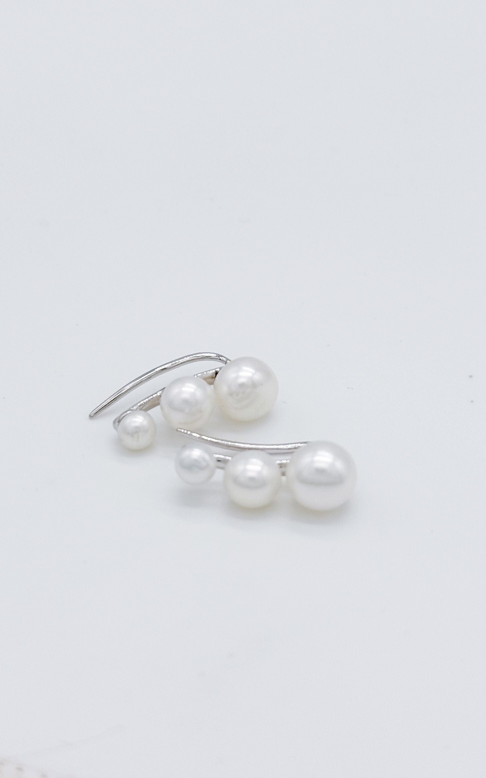 Three-pearl multiple earrings