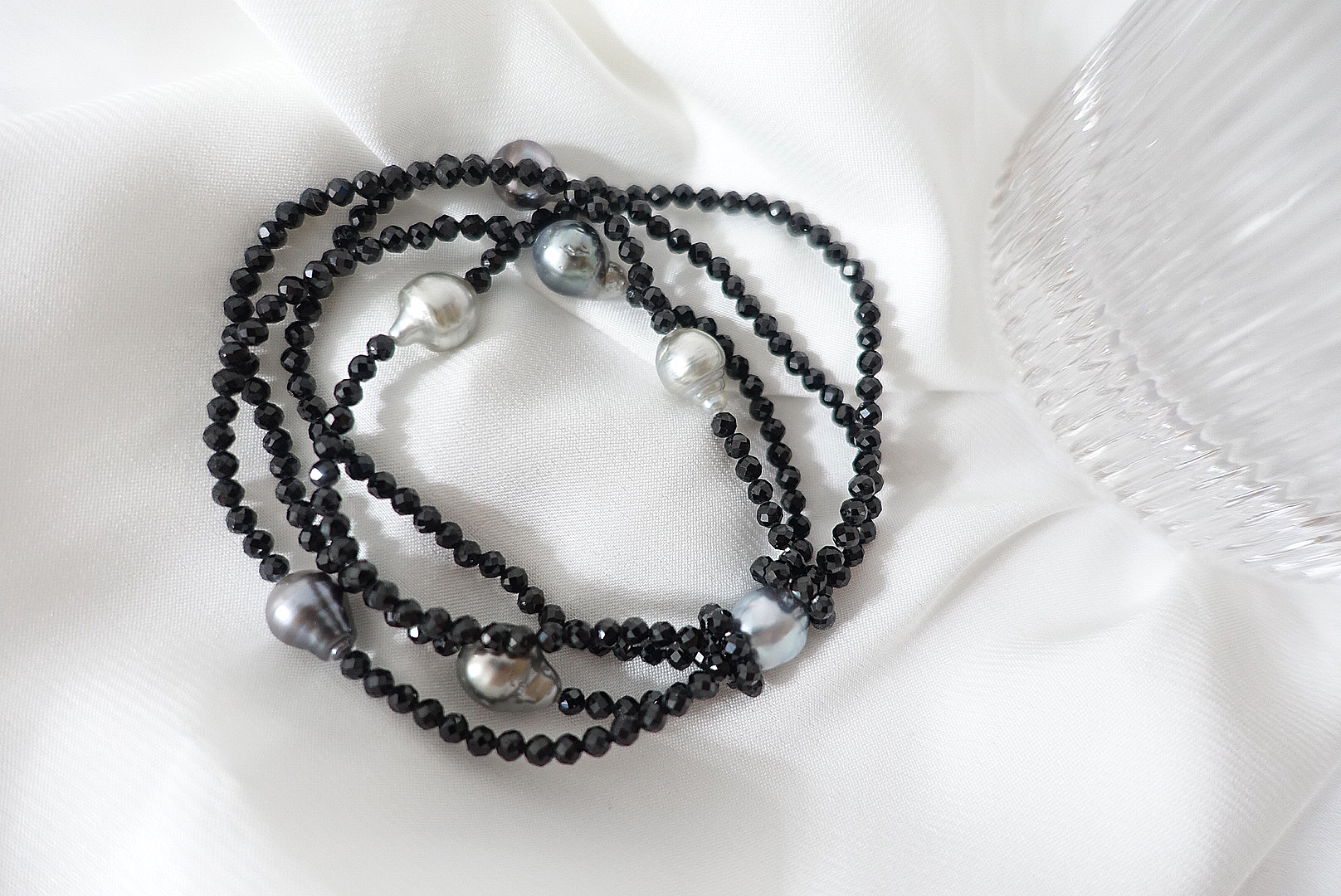 P001B010(T) Galaxy Silhouette Bracelet featuring four rows of Black Spinel and Tahitian pearls.
