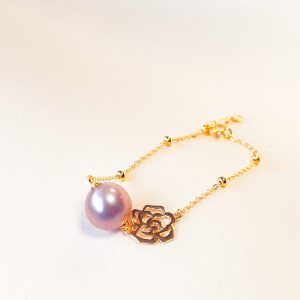 18K Gold Vermeil rose charm bracelet with a 12mm natural pink freshwater pearl on a minimalist background.