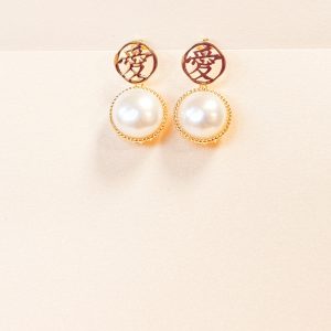 Love Character Pearl Earrings in Gold Vermeil featuring a paper-cut style design and 13mm freshwater pearls.